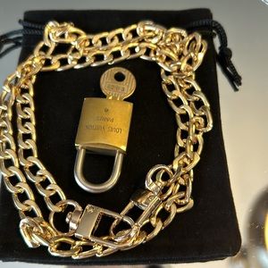 Louis Vuitton authentic brass lock and key # 203 this is a rare lock
